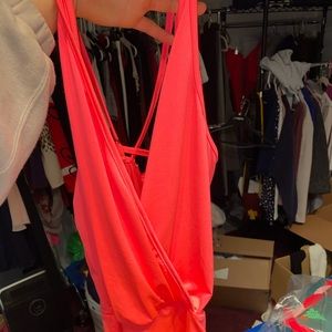 Neon pink bodysuit